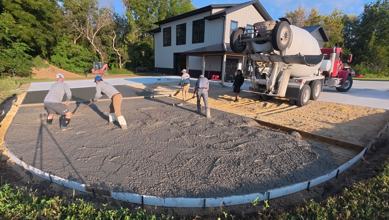 Professional concrete contractor team pouring concrete in Chelsea, MA